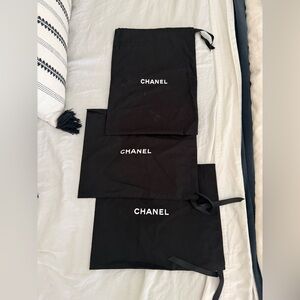 CHANEL Black Storage Bags with White Logo